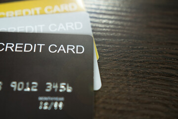 Close-up image of credit cards with selective focus.	