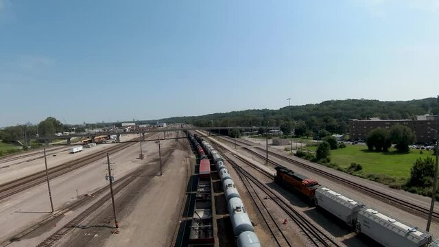 Aerial shot of large freight trains on tracks