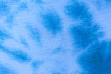 Close up tie dye fabric pattern. Hand made texture.