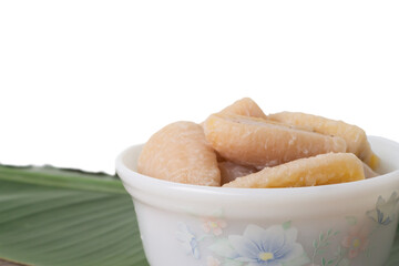 Closeup Banana in coconut milk. Asian tradition culture dessert. Fruit dessert.