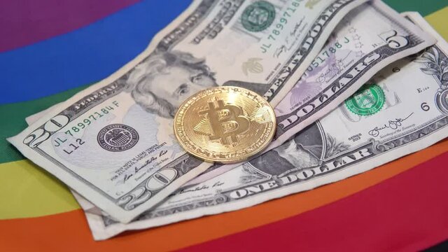 stack of fiat money and BTC bitcoin in lgbt or gay community finance