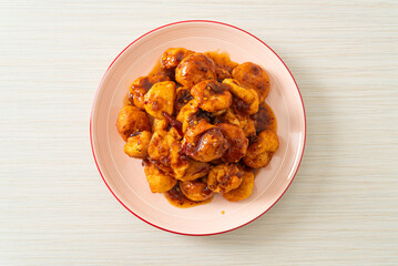 fried meatballs with spicy dipping sauce