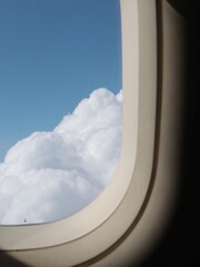 The blue sky from the airplane window / 비행기 창문과 푸른 하늘