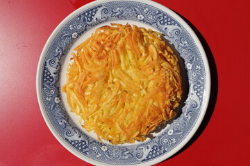 a delicious Appenzeller rösti filled with cheese
