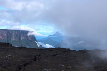 beautiful scenery with clouds between the mountains of Roraima