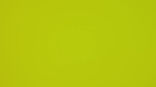 The dollar spin rotate quickly fast fly, dispart, splash to the sides with centrifugal coriolis force. The video is in reverse. Dollar twist, create pattern, make design shape circle picture.