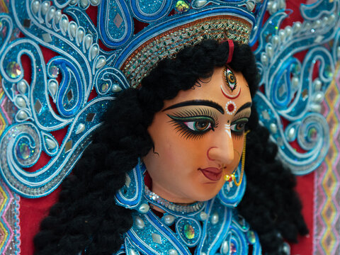 Close up of face of Hindu Goddess Durga with use of selective focus