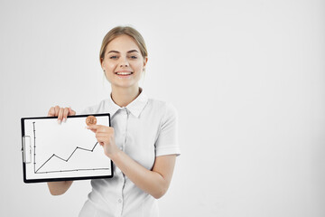 cheerful woman in a white shirt with a folder in hand technologies