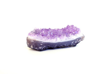 A beautiful druse of purple amethyst. Crystals of amethyst quartz. A semi-precious natural stone.