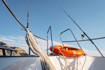 Lifebuoy saver ring on sailboat in open sea