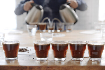 Brewing fresh coffee in cups