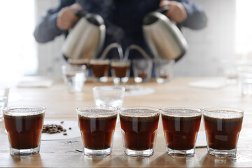Brewing fresh coffee in cups