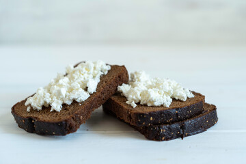 Dark bread with cottage cheese. Healthy sandwich.
