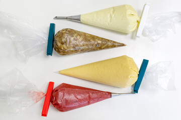 Plastic Syringe Presses with Colorful Fruit and Sweet Fillings for Baking