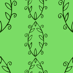 pattern of green leaves on a light green background
