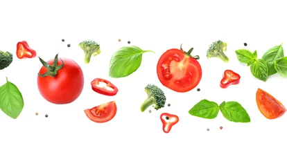 Foto auf Acrylglas Flying fresh vegetables and herbs on white background © Pixel-Shot