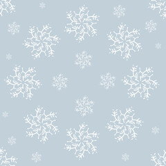 Fototapeta na wymiar Seamless pattern of snowflakes on a blue background Doodle. Wallpaper, textiles, wrapping, card, print on clothes.