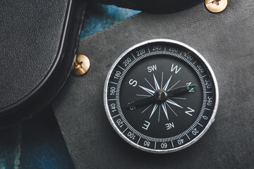 Vintage compass and notebook, closeup © Pixel-Shot