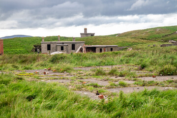 The ruins of Lenan Head fort at the north coast of County Donegal, Ireland.
