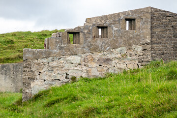 The ruins of Lenan Head fort at the north coast of County Donegal, Ireland.