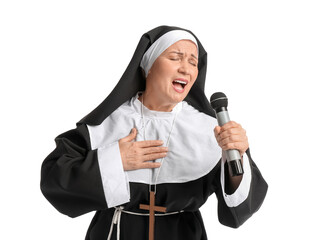 Mature nun with microphone singing on white background