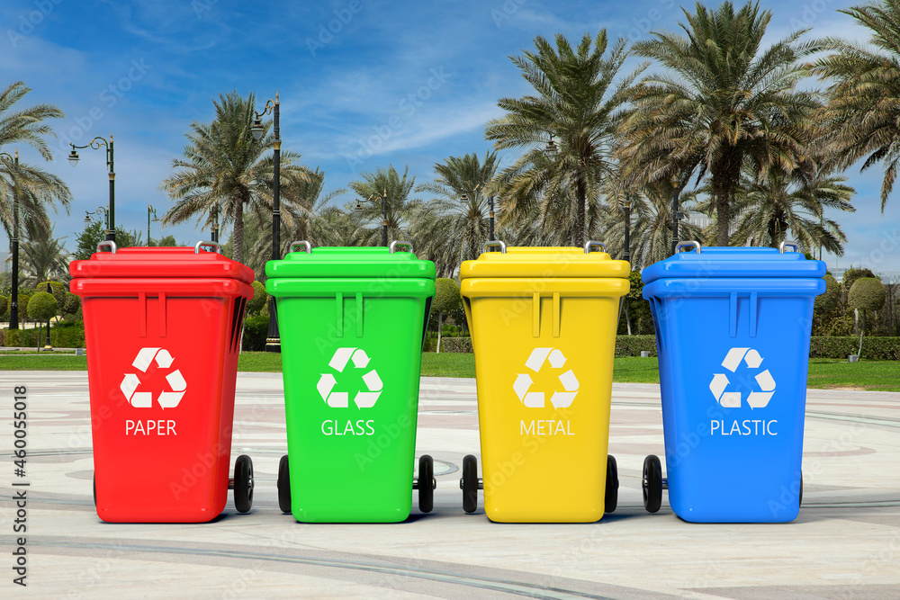 Poster multicoloured garbage trash bins with recycle signs in empty city street with palm trees. 3d renderi