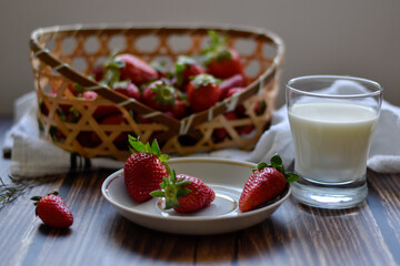 Strawberries with glass of milk