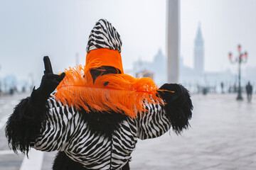 Colorful carnival masks at a traditional festival in Venice, Italy