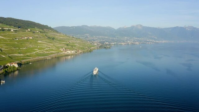 Lausanne Pleasure Boat Cruise At Lake Leman With Scenic Vineyard Views Near Rivaz Village In Switzerland. - aerial pullback