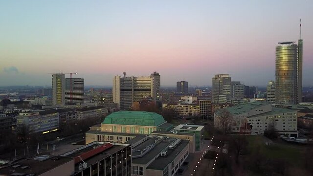 The city skyline of Essen in Germany at sunset