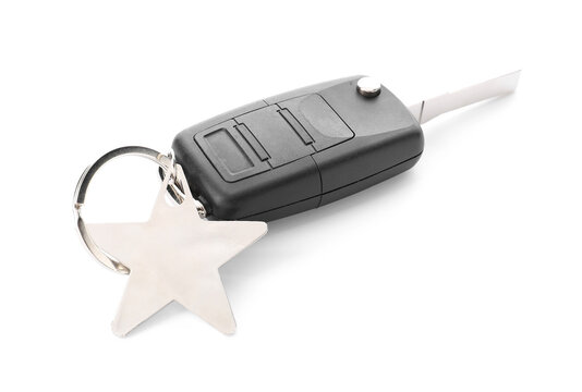 Car Key With Star Shape Keychain On White Background