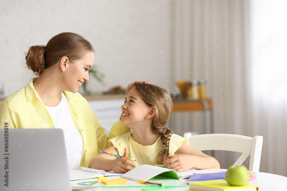 Sticker Little girl with her mother doing lessons at home