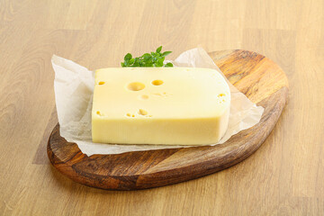 Maasdam cheese over the board