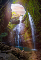 The Majestic Madakaripura Waterfall is the tallest waterfall in East Java, Indonesia. The towering...