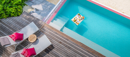 Breakfast in swimming pool, floating breakfast luxurious tropical resort. Top view tray relax on...