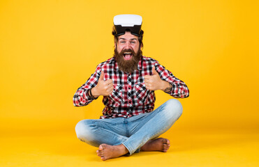 modern handsome bearded guy with unshaven face and stylish hairdo wear casual clothes in vr...