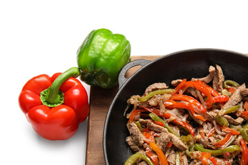 Delicious beef Fajita in frying pan on white background