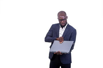 portrait of a young businessman opening laptop.