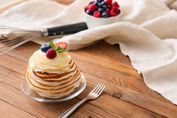 Tasty Pavlova cake on table