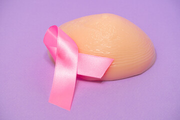 Breast prosthesis and pink ribbon