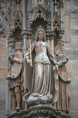 Figures of Saints and Royal family at walls of the famous ancient iconic Stephan Cathedral in historical touristic downtown of Vienna, Austria.