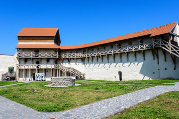 Feldioara - Marienburg Medieval Fortress (Cetatea Feldioara) after renovation in Brasov county, in the southern part of Transylvania (Transilvania) region, Romania in a sunny summer day.