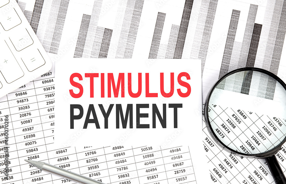 Poster stimulus payment text on the paper with calculator,magnifier ,pen on the graph background