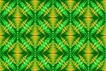 Ikat green-brown geometric folk ornament, seamless tribal ethnic fabric pattern in Aztec style, tribal embroidery, Indian, folk pattern, green background cloth pattern