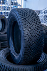 photographs of car tires, detailed and general plan. tires are folded in rows or on each side