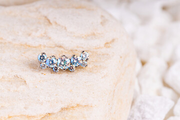 Beautiful piercing jewelry. Macro shot. Selective focus.