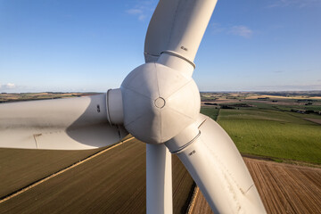 Naklejka na ściany i meble Close Up View of a Wind Turbine For Renewable Green Electricity