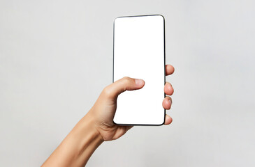 Woman hand holding phone on white background with copy space