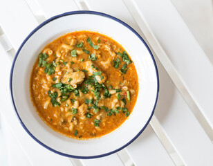 creamy prawn and fish soup bowl on barcelona restaurant table