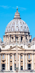 Fototapeta na wymiar Papal Basilica of St. Peter in the Vatican. Front detailed view of dome.
